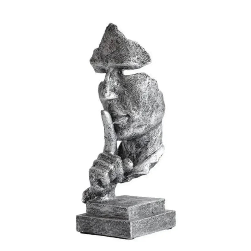 Escultura "Silêncio Vale Ouro"